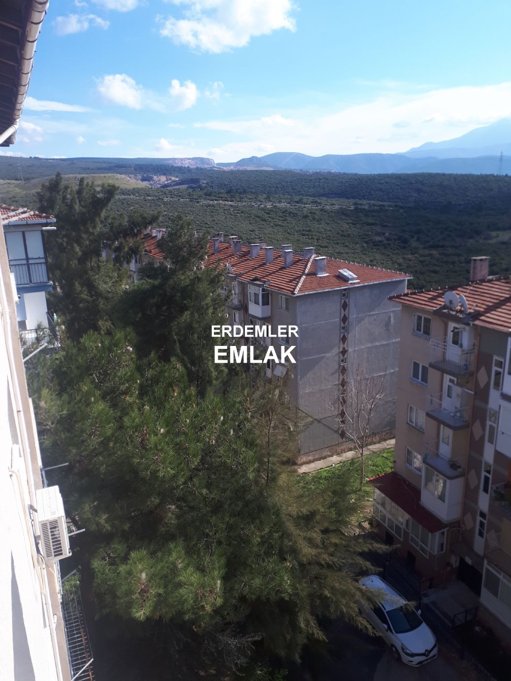ERDEMLERDEN EVKA 3 MERKEZİNDE MANZARALI BAKIMLI PANJURLU DAİRE