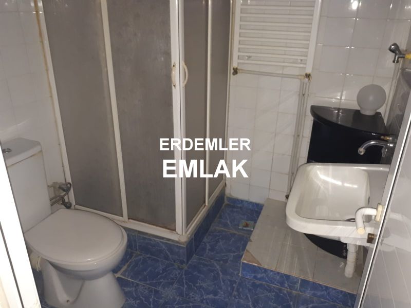 ERDEMLERDEN EVKS MERKEZİNDE ARA KAT BAKIMLI DOGALGAZLI MANZARALI 1+1