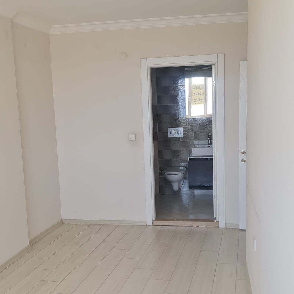ERDEMLERDEN BAYRAKLI GÜMÜŞPALADA DENİZ MANZARLI ASNSÖRLÜ 2+1